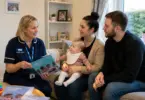 Specialist Community Public Health Nurse providing health visiting support to a family in Telford.